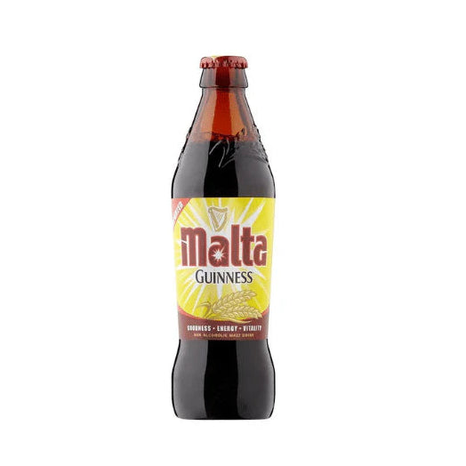 Bottle of Malta Guinness on a white background
